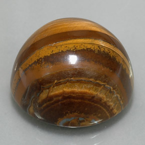 Натуральный коричневый tiger's eye 35,88 карата огранка круг, непрозрачный