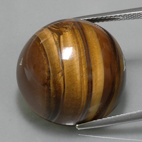 Натуральный коричневый tiger's eye 38,33 карата огранка круг, непрозрачный