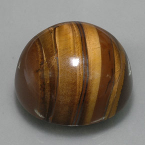 Натуральный коричневый tiger's eye 38,33 карата огранка круг, непрозрачный