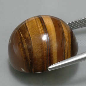 Натуральный коричневый tiger's eye 38,33 карата огранка круг, непрозрачный