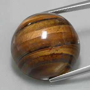Натуральный коричневый tiger's eye 36,56 карата огранка круг, непрозрачный