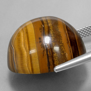 Натуральный коричневый tiger's eye 37,72 карата огранка круг, непрозрачный