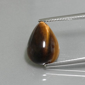 Натуральный коричневый tiger's eye 5,67 карата форма груши, непрозрачный