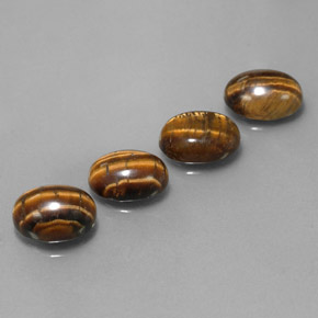  карата, натуральный Золотисто-коричневый Тигровый глаз, Огранка Овал, Непрозрачный