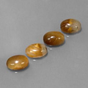 Натуральный коричневый tiger's eye 7,27 карата огранка овал, непрозрачный