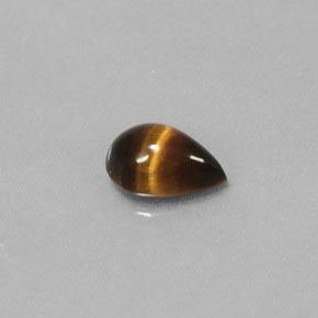 Натуральный коричневый tiger's eye 0,70 карата форма груши, непрозрачный