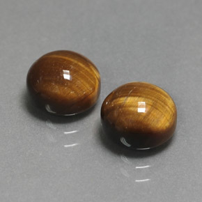 Натуральный коричневый tiger's eye  карата огранка круг, непрозрачный