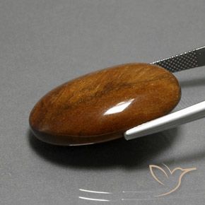 33.96 карата, натуральный Темно-коричневая коричневая Тигровый глаз, Овал, Непрозрачный