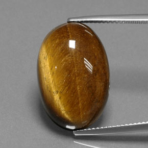 Натуральный коричневый tiger's eye 18,74 карата огранка овал, непрозрачный