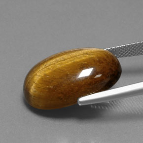 Натуральный коричневый tiger's eye 18,74 карата огранка овал, непрозрачный