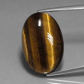 Натуральный коричневый tiger's eye 20,40 карата огранка овал, непрозрачный