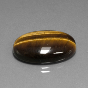 Натуральный коричневый tiger's eye 20,40 карата огранка овал, непрозрачный