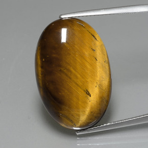 Натуральный коричневый tiger's eye 19,59 карата огранка овал, непрозрачный