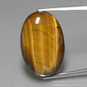 Натуральный коричневый tiger's eye 20,74 карата огранка овал, непрозрачный