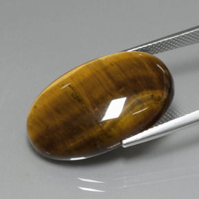 Натуральный коричневый tiger's eye 19,40 карата огранка овал, непрозрачный