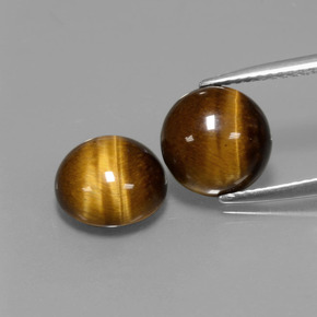 Натуральный коричневый tiger's eye  карата огранка круг, непрозрачный