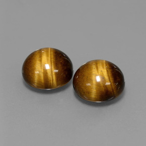 Натуральный коричневый tiger's eye  карата огранка круг, непрозрачный