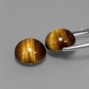 Натуральный коричневый tiger's eye  карата огранка круг, непрозрачный