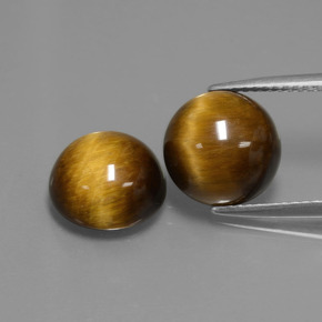 Натуральный золотисто-коричневый тигровый глаз  карата огранка круг, непрозрачный