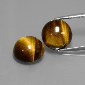 Натуральный коричневый tiger's eye  карата огранка круг, непрозрачный