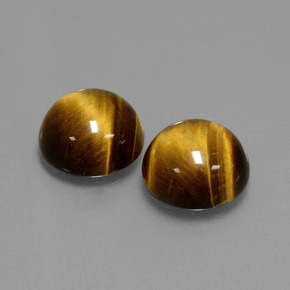 Натуральный коричневый tiger's eye  карата огранка круг, непрозрачный
