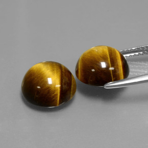 Натуральный коричневый tiger's eye  карата огранка круг, непрозрачный