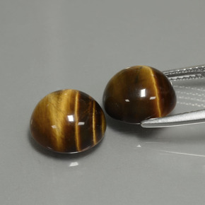 Натуральный коричневый tiger's eye  карата огранка круг, непрозрачный