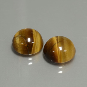 Натуральный коричневый tiger's eye  карата огранка круг, непрозрачный