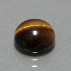Натуральный коричневый tiger's eye 2,79 карата огранка круг, непрозрачный