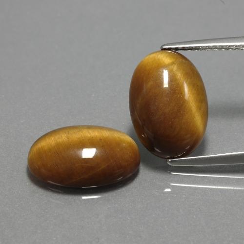 Натуральный коричневый tiger's eye 9,04 карата огранка овал, непрозрачный