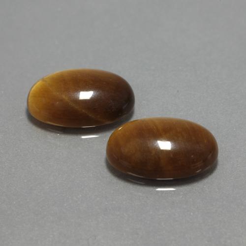 Натуральный коричневый tiger's eye 9,04 карата огранка овал, непрозрачный