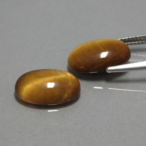 Натуральный коричневый tiger's eye 9,04 карата огранка овал, непрозрачный