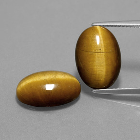  карата, натуральный Золотисто-коричневый Тигровый глаз, Огранка Овал, Непрозрачный