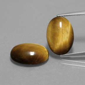 Натуральный коричневый tiger's eye 9,10 карата огранка овал, непрозрачный