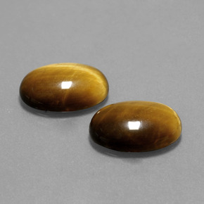 Натуральный коричневый tiger's eye 9,10 карата огранка овал, непрозрачный