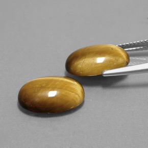 Натуральный коричневый tiger's eye 9,10 карата огранка овал, непрозрачный