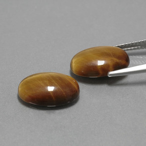  карата, натуральный Золотисто-коричневый Тигровый глаз, Огранка Овал, Непрозрачный