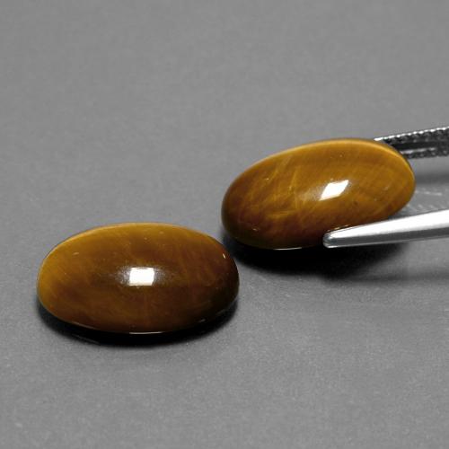 8.94 карата, натуральный Золотисто-коричневый Тигровый глаз, Огранка Овал, Непрозрачный