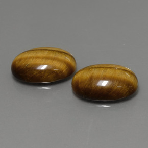 Натуральный коричневый tiger's eye  карата огранка овал, непрозрачный