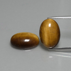 Натуральный коричневый tiger's eye 9,08 карата огранка овал, непрозрачный