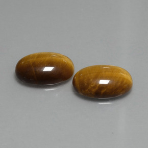 Натуральный коричневый tiger's eye 9,08 карата огранка овал, непрозрачный
