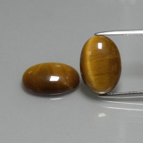 Натуральный коричневый tiger's eye 9,04 карата огранка овал, непрозрачный