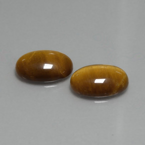 Натуральный коричневый tiger's eye 9,04 карата огранка овал, непрозрачный