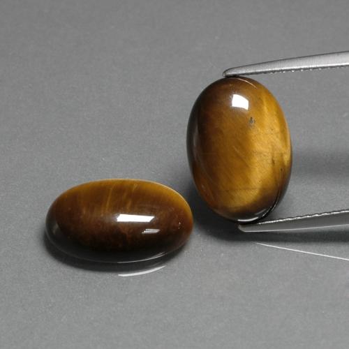 9.11 карата, натуральный Золотисто-коричневый Тигровый глаз, Огранка Овал, Непрозрачный
