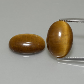 Натуральный коричневый tiger's eye 9,19 карата огранка овал, непрозрачный