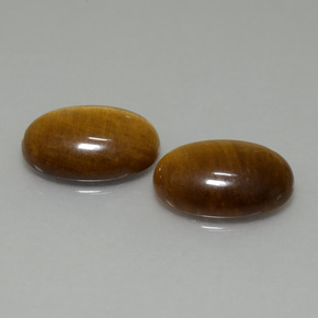 Натуральный коричневый tiger's eye 9,19 карата огранка овал, непрозрачный