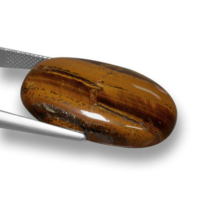 Натуральный коричневый tiger's eye 33,59 карата огранка овал, непрозрачный