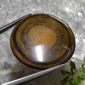 Натуральный коричневый tiger's eye 59,01 карата огранка круг, непрозрачный