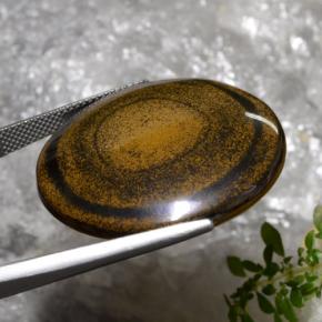 Натуральный коричневый tiger's eye 59,01 карата огранка круг, непрозрачный