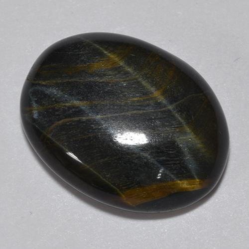 Натуральный многоцветный tiger's eye 11,75 карата огранка овал, непрозрачный